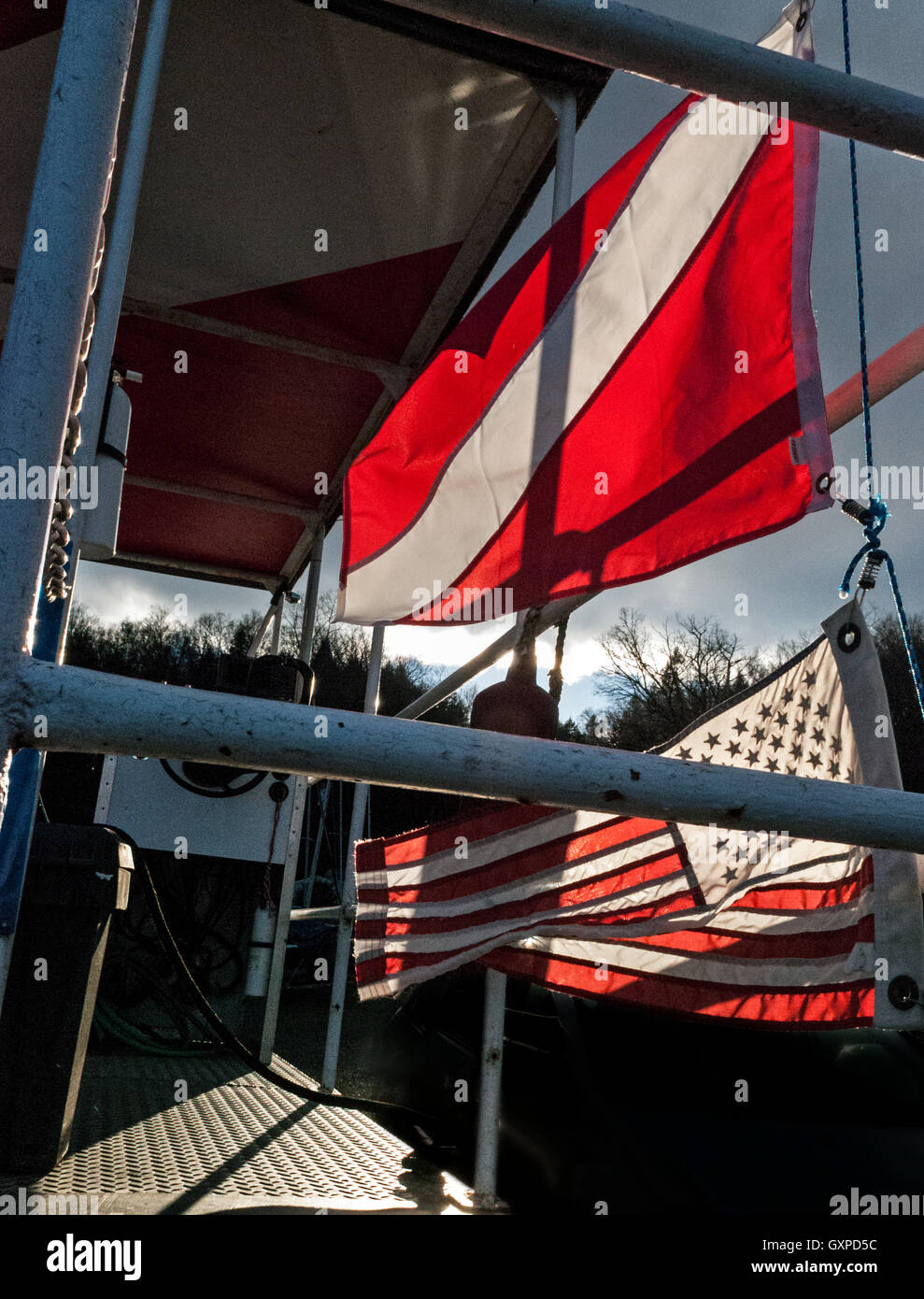 Scuba flag and American flag on a boat Stock Photo