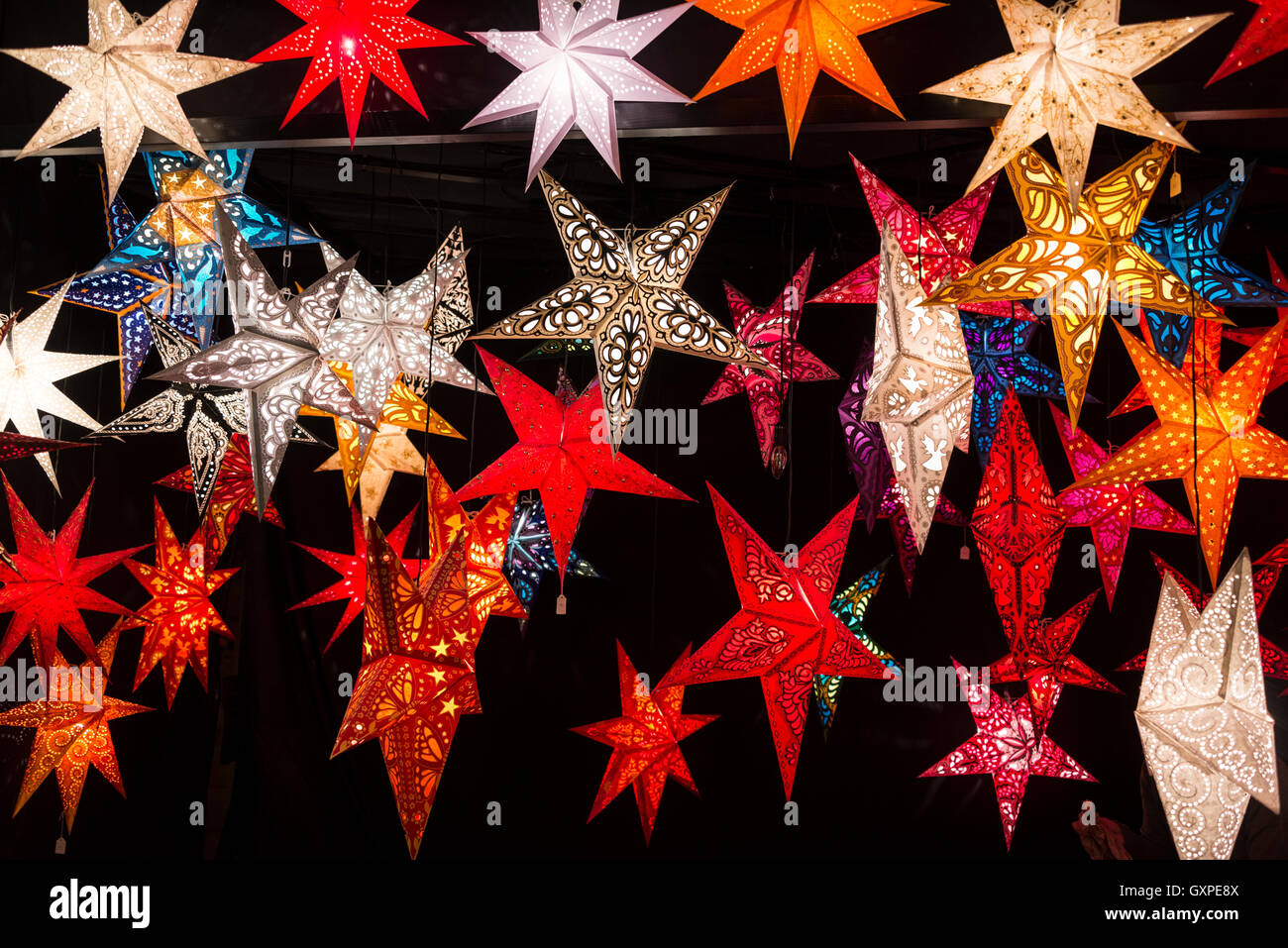 Colourful German Christmas decorations on sale at the Tollwood Winter Festival at Theresienwiese in Munich, Bavaria, Germany, Stock Photo