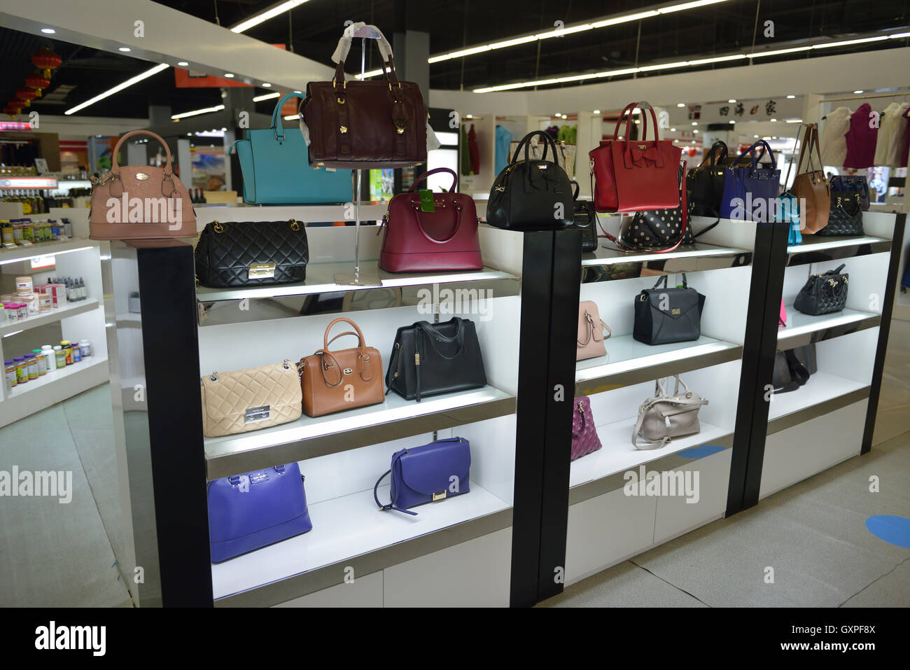 Luxury handbags from various countries at Zhongdamen Bonded Commodity O2O shopping center in Zhengzhou, Henan, China. 06-Sep-201 Stock Photo