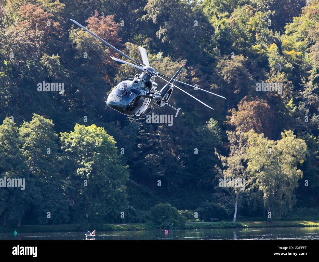 Exercise of a SWAT team, German police, anti Terror police unit, fast roping from a helicopter, Stock Photo
