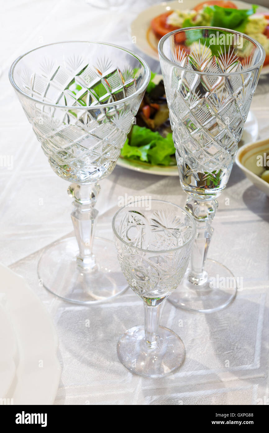 beautiful crystal glasses on the dining table Stock Photo Alamy