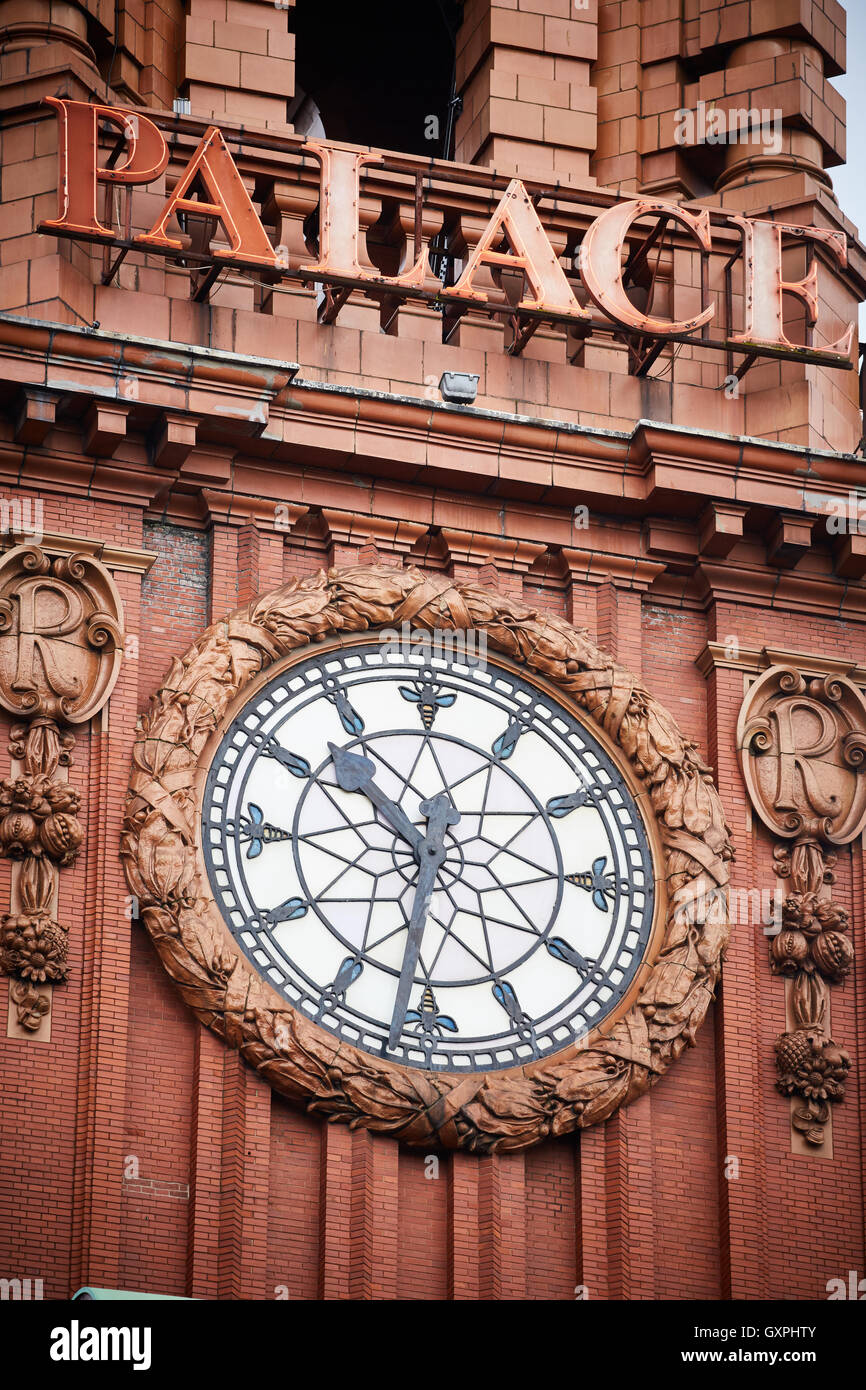 Landmark manchester Palace Hotel clock   Red brick clock tower face time sign palatial Victorian close up detail ornate Historic Stock Photo