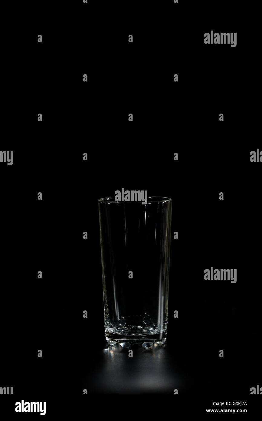Glass Cup On Black Stock Photo - Download Image Now - Black Background,  Black Color, Color Image - iStock