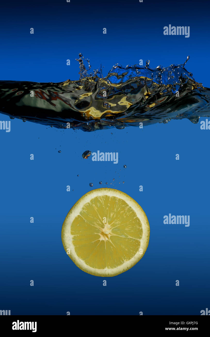 Exotic tropical fruit lemon floats under water Stock Photo Alamy