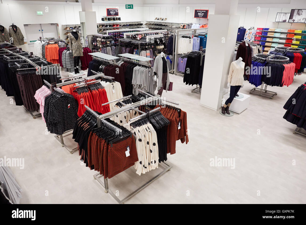 clearance section of a clothing store Stock Photo - Alamy