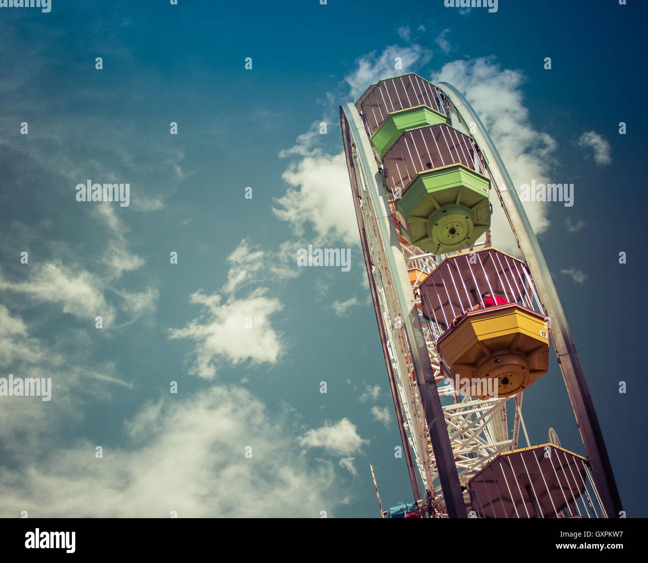 Ferris Wheel Against Blue Sky Stock Photo - Alamy