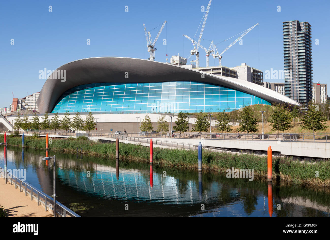 The London Aquatics Centre can be seen with the new development of the International Quarter being built behind it. Stock Photo