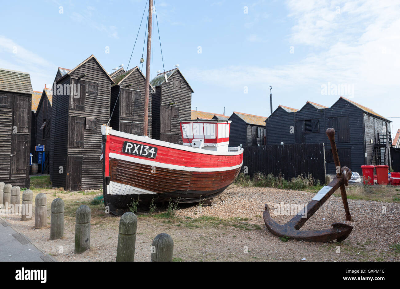 A view of the wooden Fishing Sheds, Boat and Net Shops on the seafront in Hastings. Stock Photo