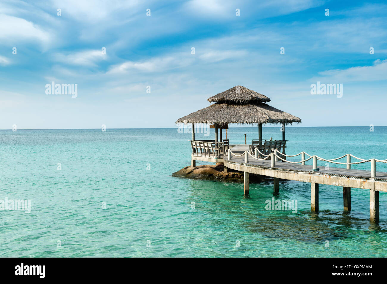Summer, Travel, Vacation and Holiday concept - Wooden pier in Phuket, Thailand. Stock Photo