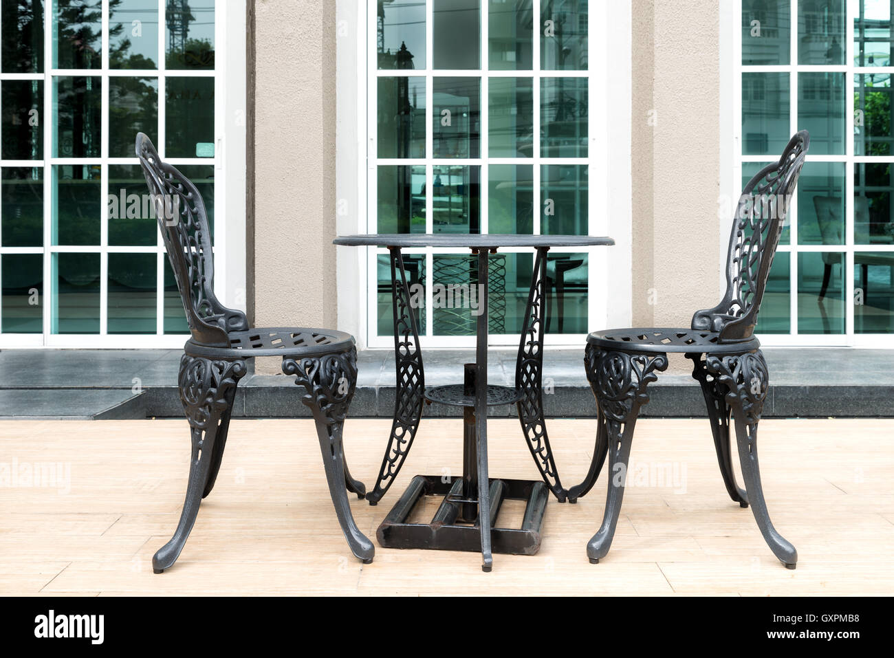 Black chair on patio in European style house. Outdoor house. Stock Photo