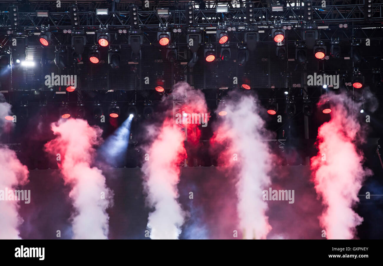 Stage lights and colorful smoke on electric concert Stock Photo Alamy