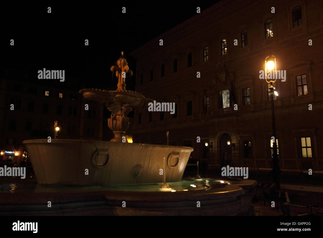 The fountain of Piazza Farnese by night, Rome ,Italy Stock Photo