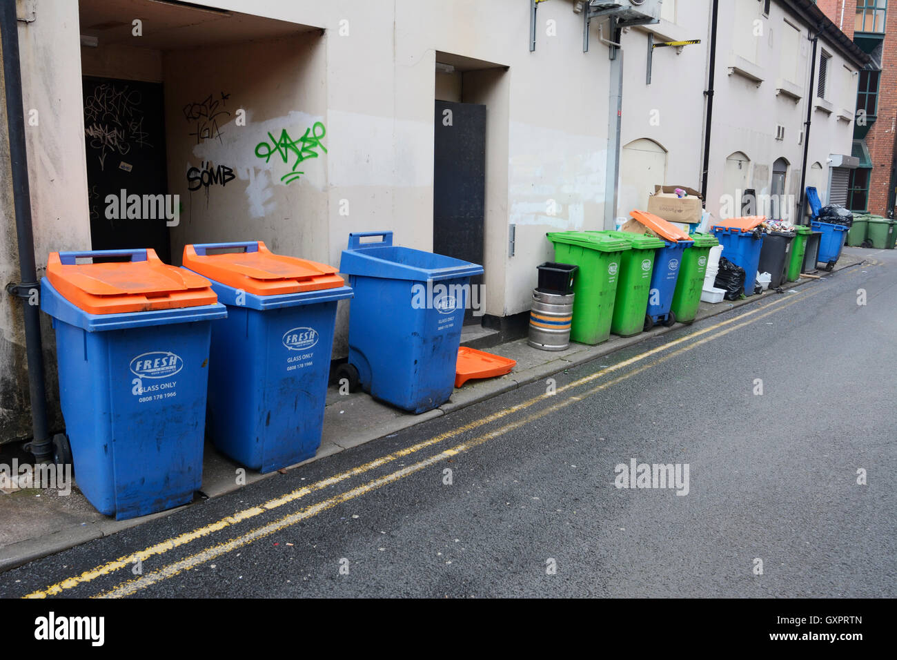 A collection of wheeliebins in Manchester City centre. Stock Photo