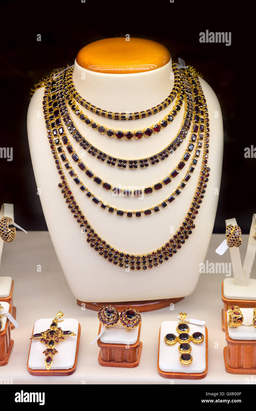 Fine Garnet gold jewelry shop window display, traditional jewellery of Czech, Prague, Europe Stock Photo