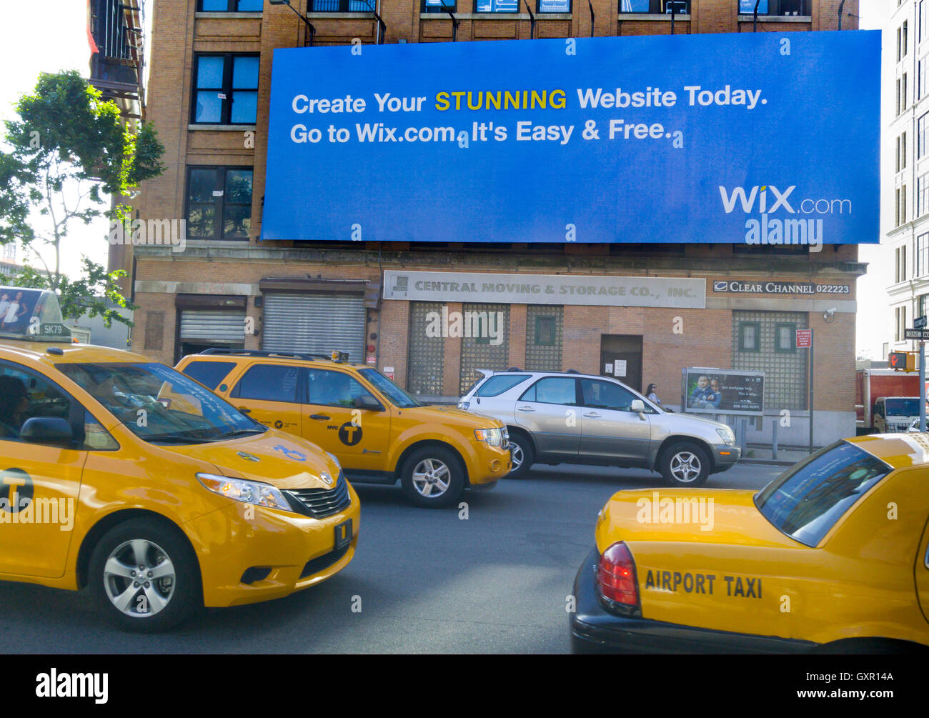 Streetview  of Manhattan, New York, NY. with blue billboard Stock Photo