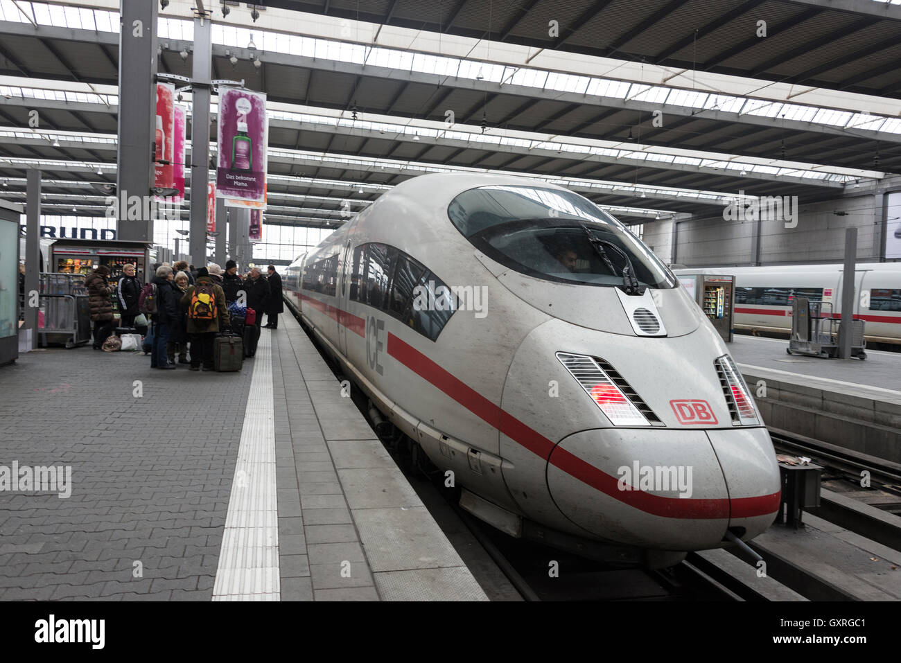 A DB ICE ( Inter City Express) passenger train at Munich mainline station in Germany Stock Photo