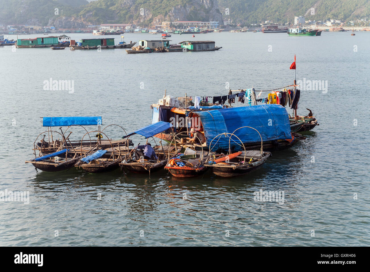 Floating village in Halong Bay, Vietnam Stock Photo - Alamy