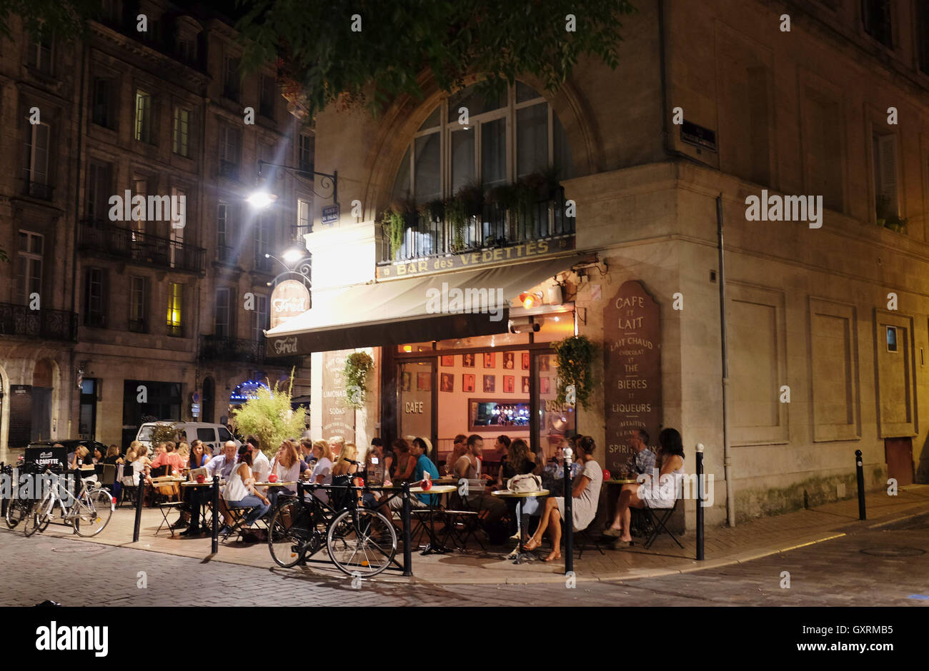 Restaurants at night in Bordeaux France Stock Photo