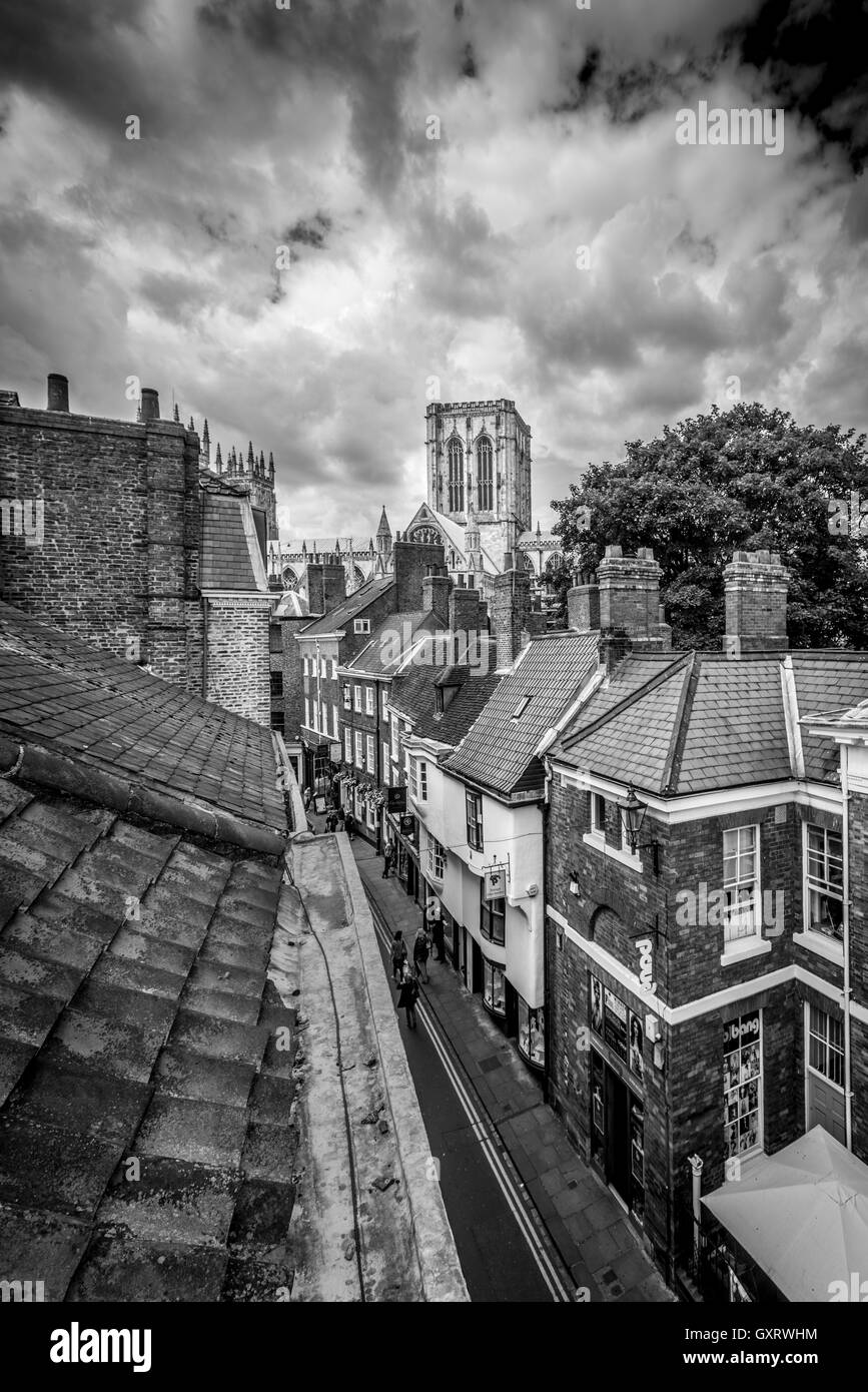 South Transept and Central Tower of York Minster viewed from rooftops of Petergate, York, UK Stock Photo
