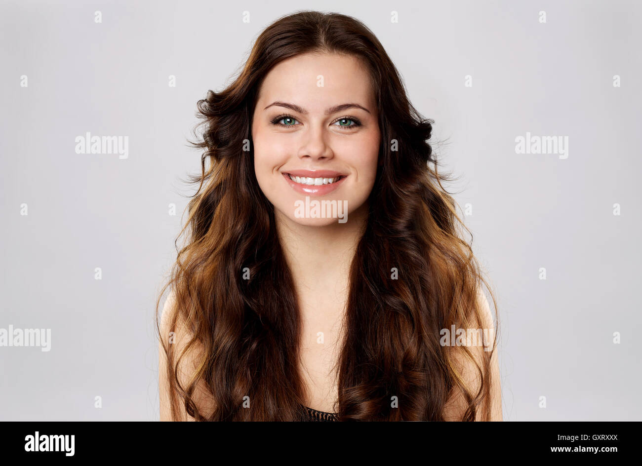 happy young woman smiling Stock Photo - Alamy