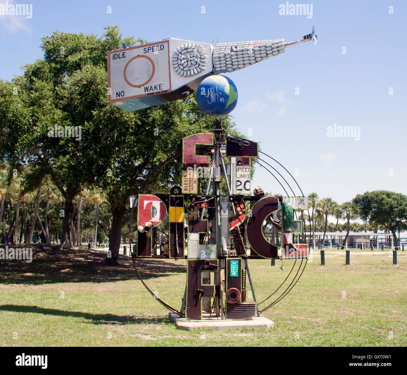 Scrap Metal Space Capsule in Fort Pierce, Florida is a creative sculpture made from recycled metal, blending space themes and industrial art. Stock Photo