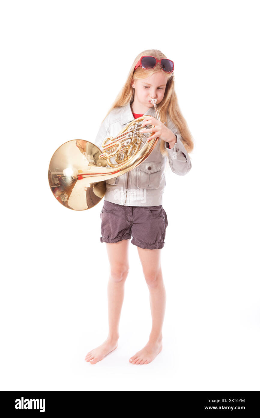 young girl playing french horn Stock Photo - Alamy
