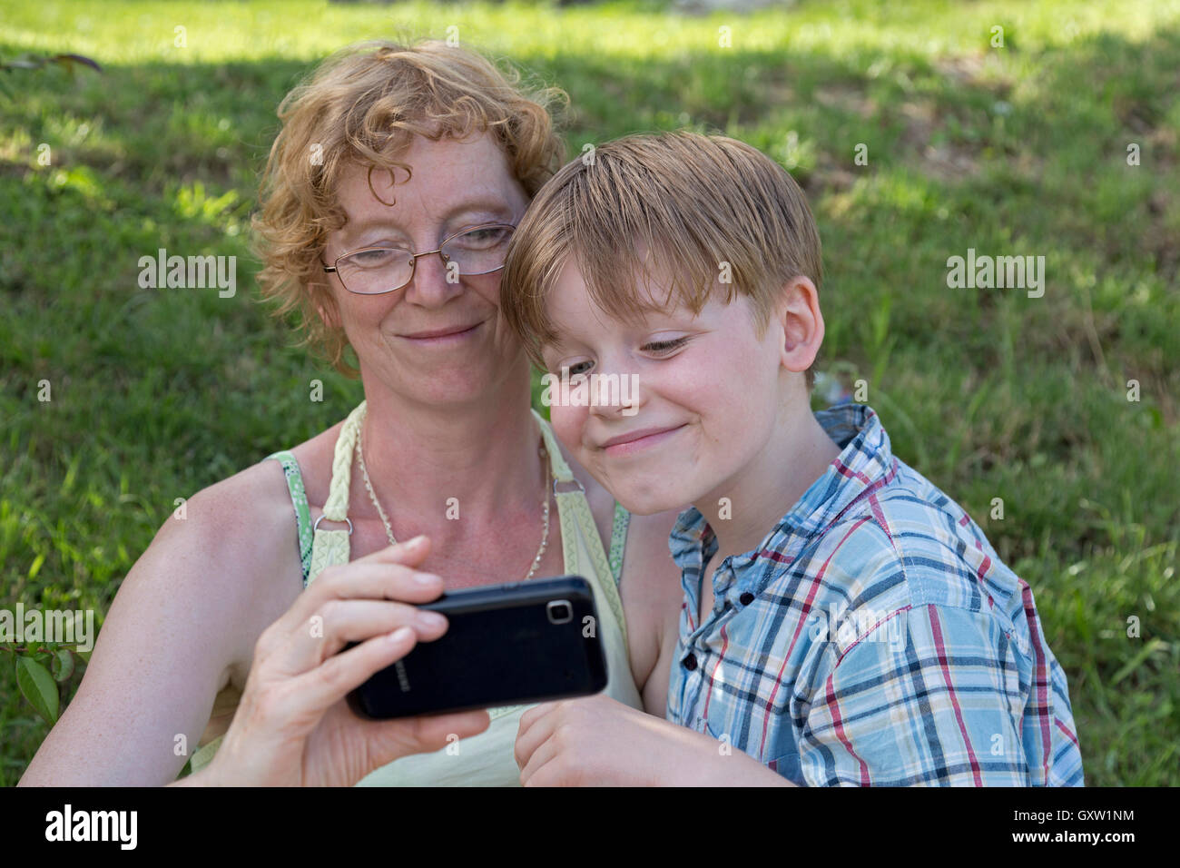 mother and son taking a picture of themselves Stock Photo