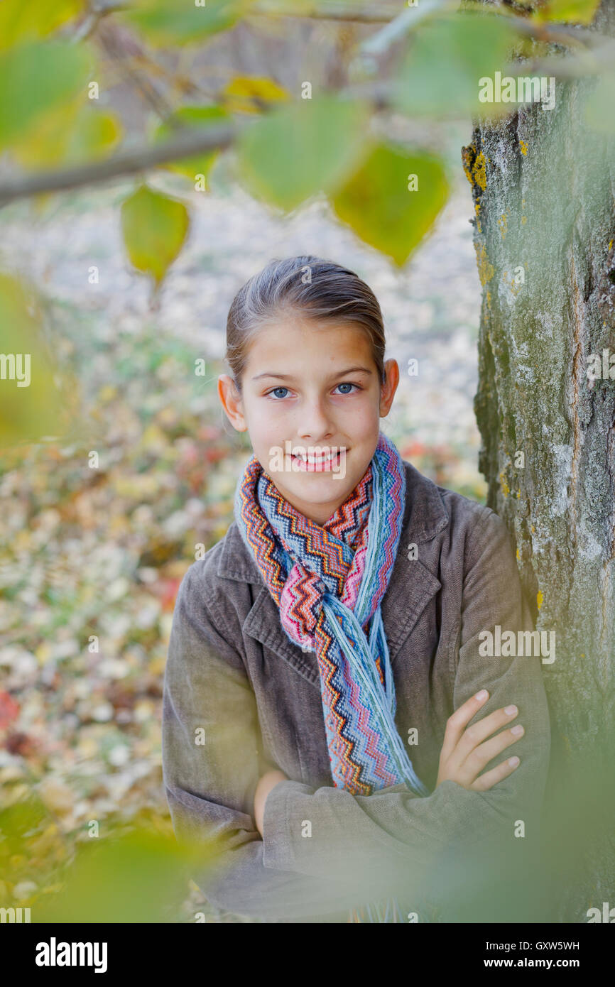 Girl walking in a autumn park Stock Photo - Alamy