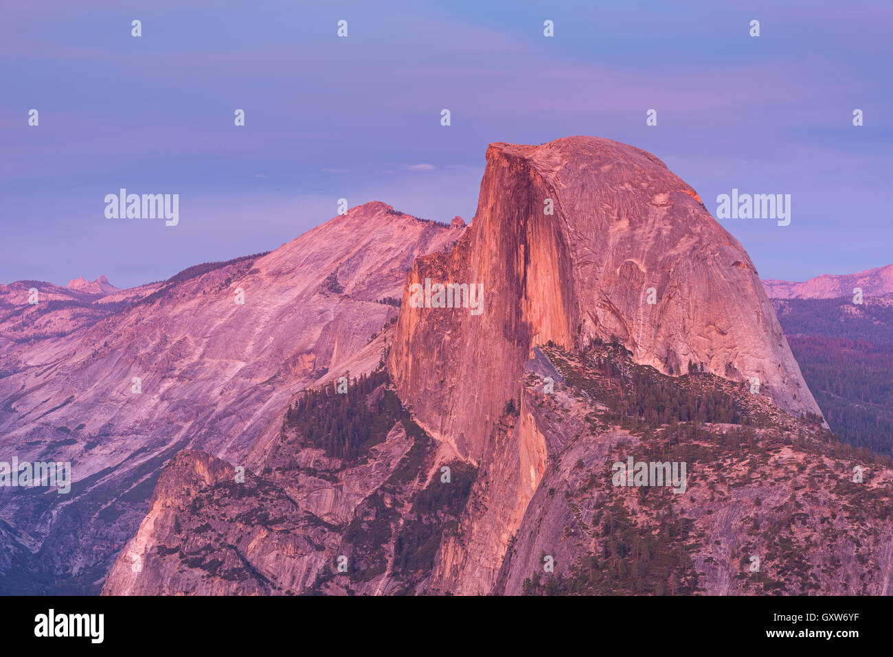 Last light glowing on the face of Half Dome from Glacier Polint, Yosemite Valley, California, USA. Stock Photo