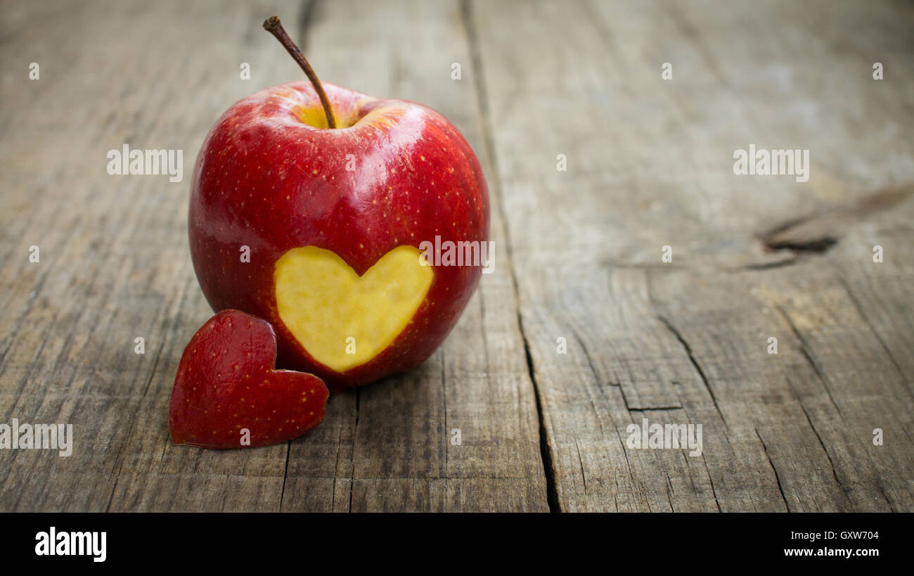 Apple with engraved heart Stock Photo