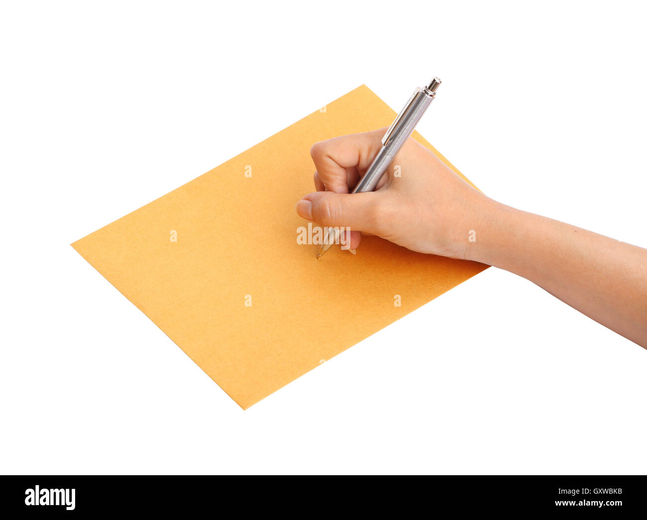hand with pen writing on the envelope Stock Photo