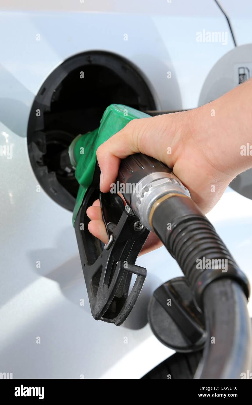 Gas Station Refill Hand and Nozzle Stock Photo Alamy