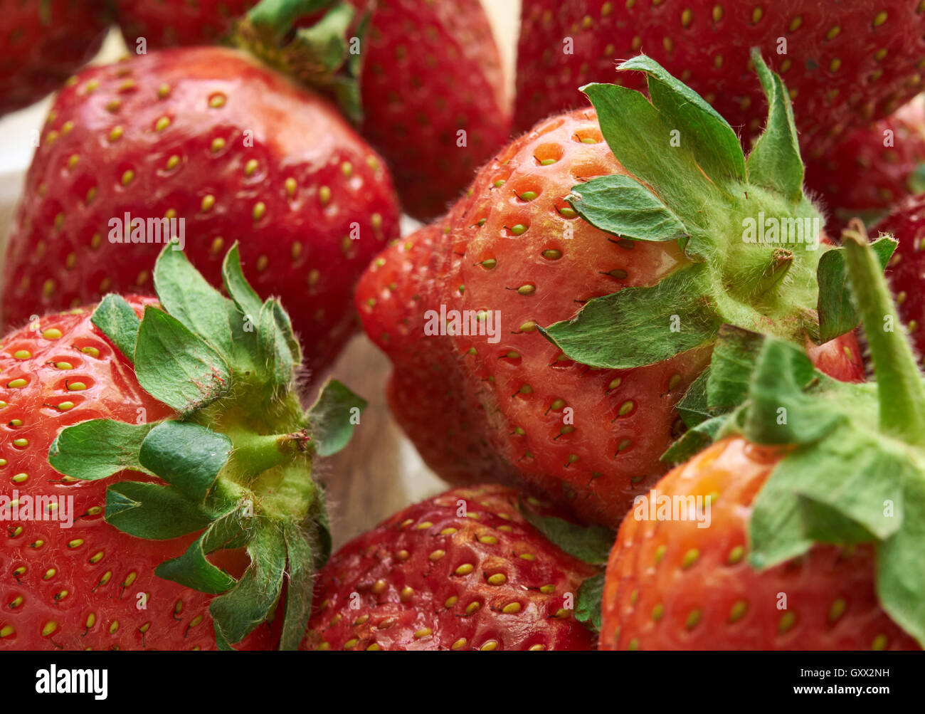 scattering of ripe strawberries closeup Stock Photo - Alamy