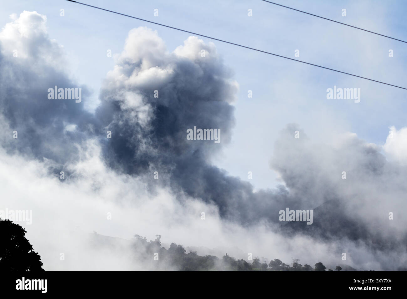 steam and ash views try the fog from an eruption of the Turrialba Volcano June 21 2016 Stock Photo