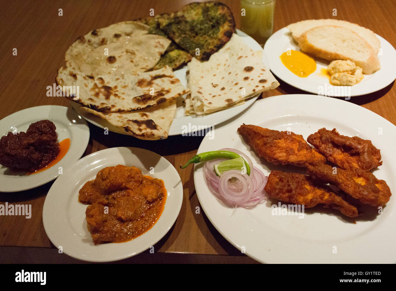 Assortment of Indian food at a potluck Stock Photo Alamy