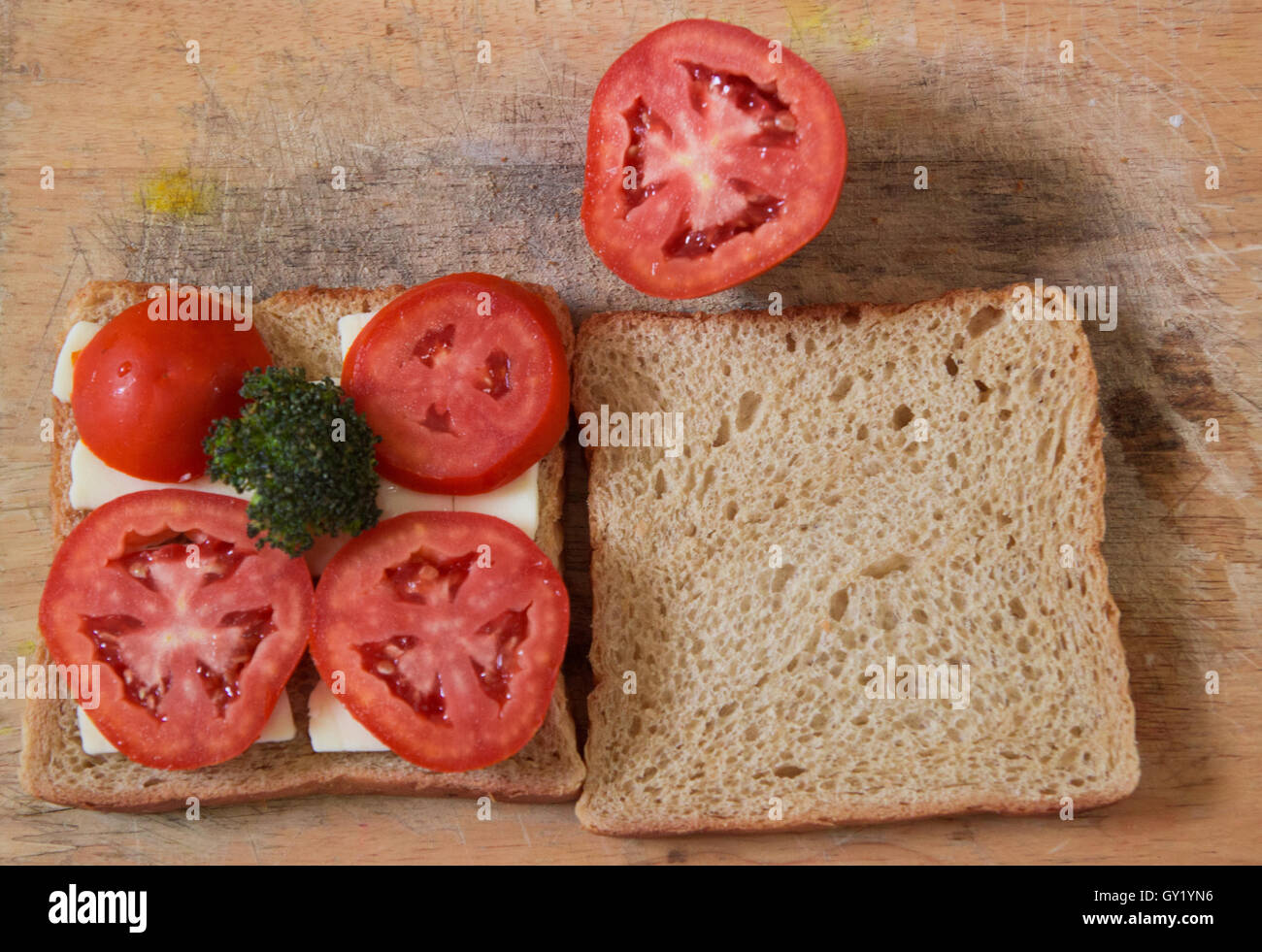 Tomato cheese broccoli wheat bread sandwich breakfast Stock Photo