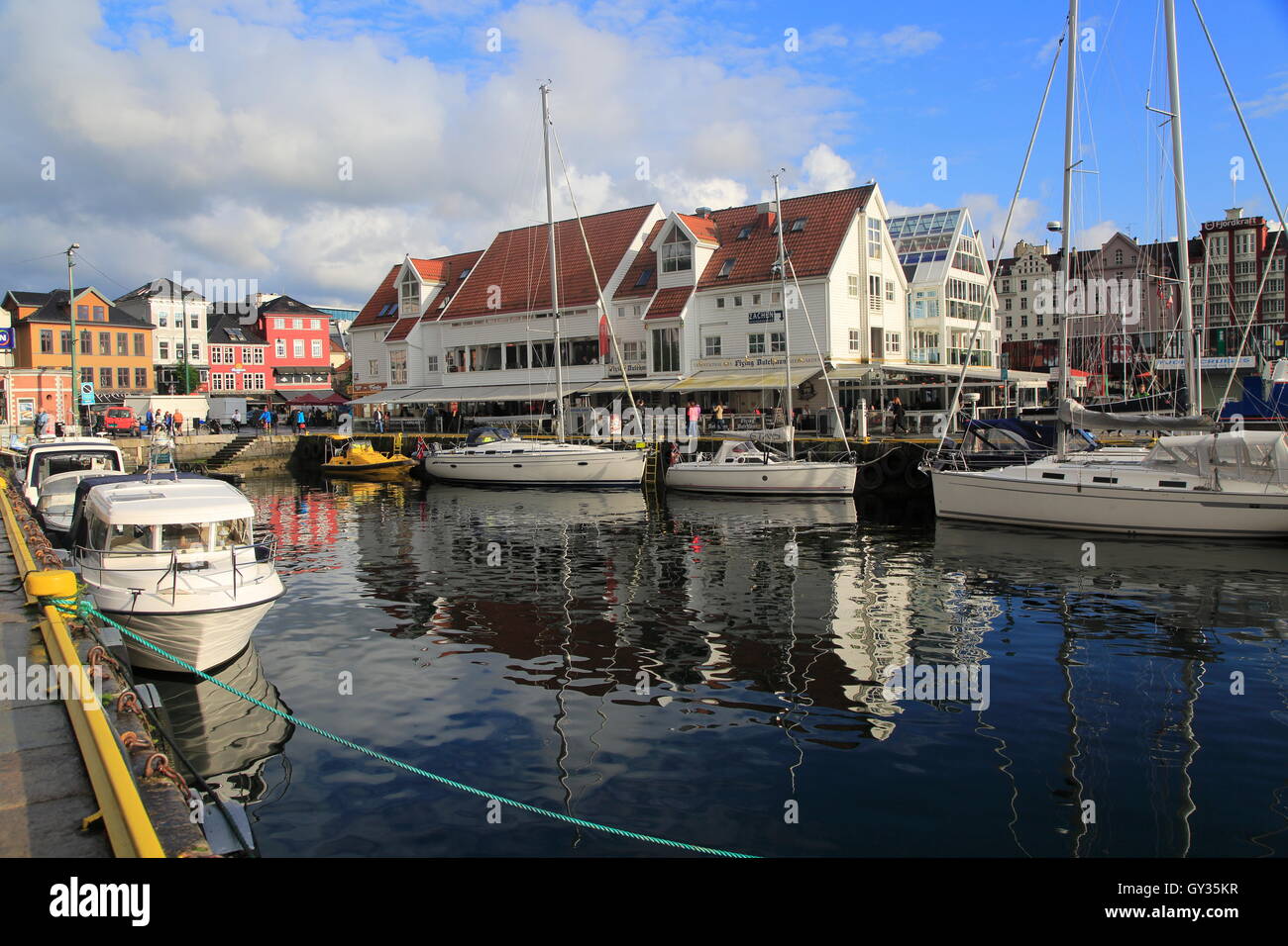 Sailing yachts and historic buildings, Vagen harbour, Bergen, Norway Stock Photo