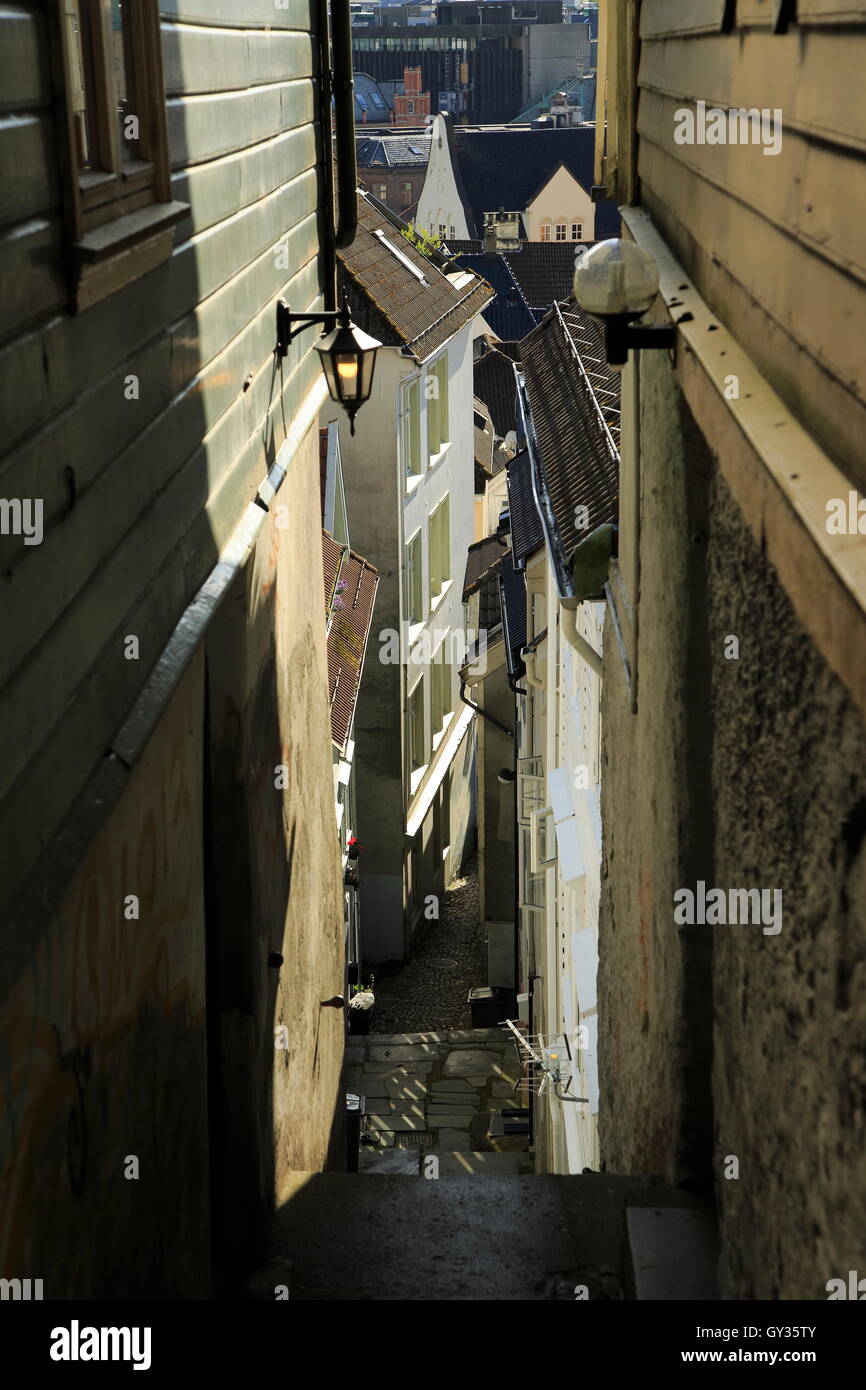 Narrow alleyway in old housing area of Bergen, Norway Stock Photo