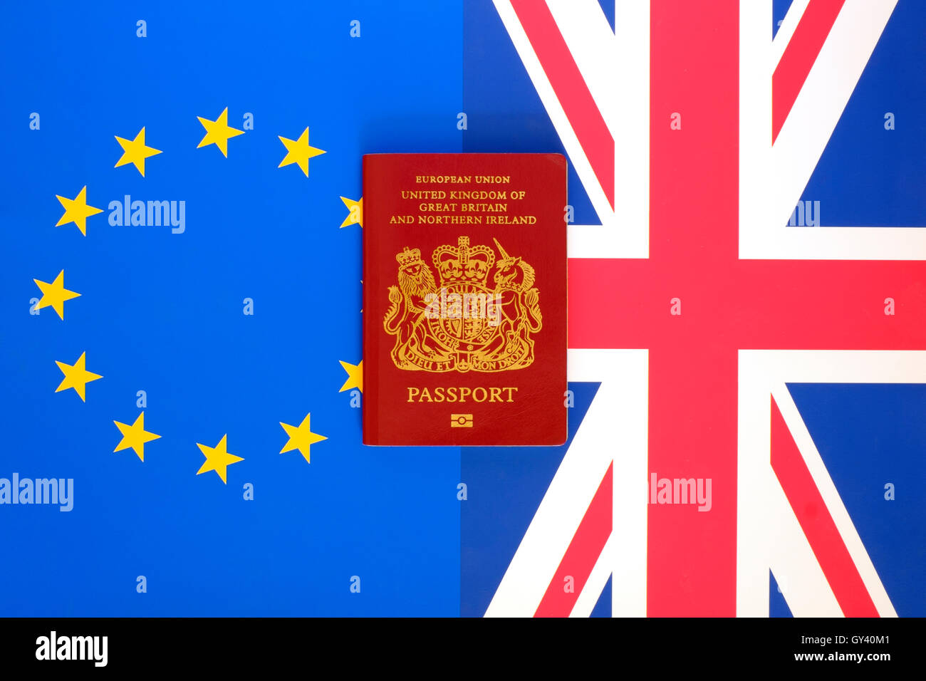 united kingdom european union burgundy passport on a uk and eu flags