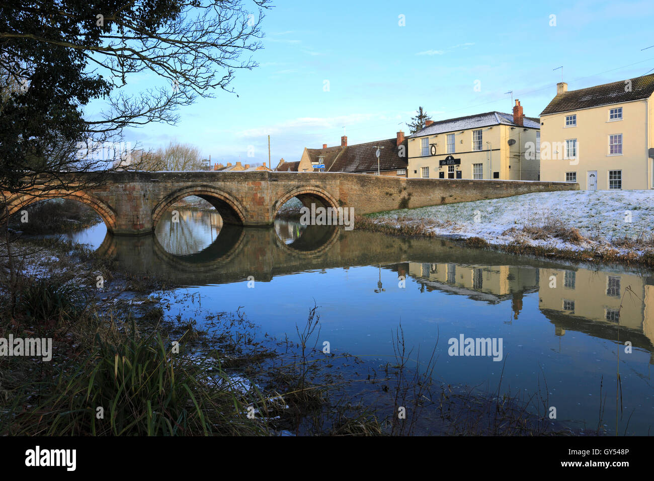 January, Winter snow, Stone bridge, river Welland, Market Deeping town, Lincolnshire; England; UK Stock Photo