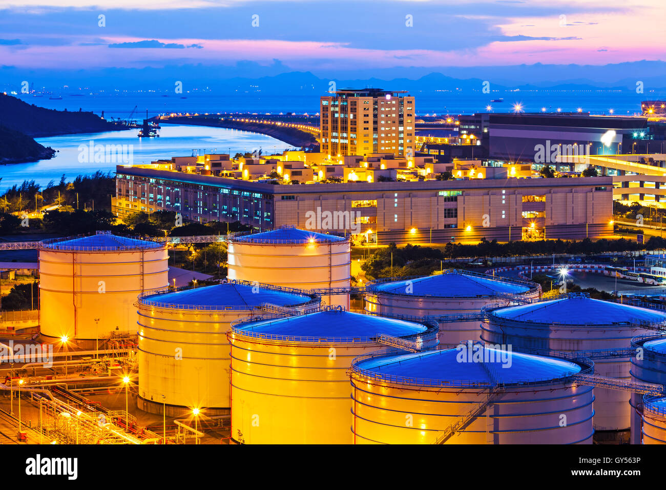 Oil tanks at night Stock Photo Alamy