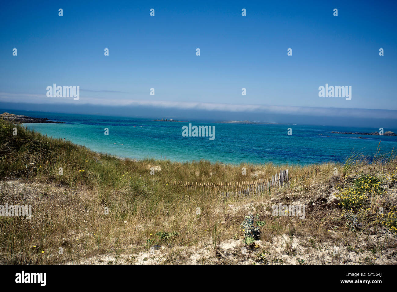 Beach with Path and Fence in Brittany France on a sunny day in summer Stock Photo