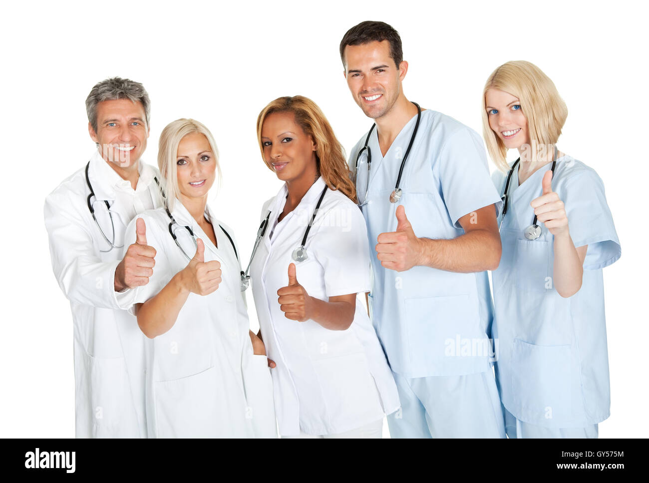 Friendly group of doctors with thumbs up on white Stock Photo