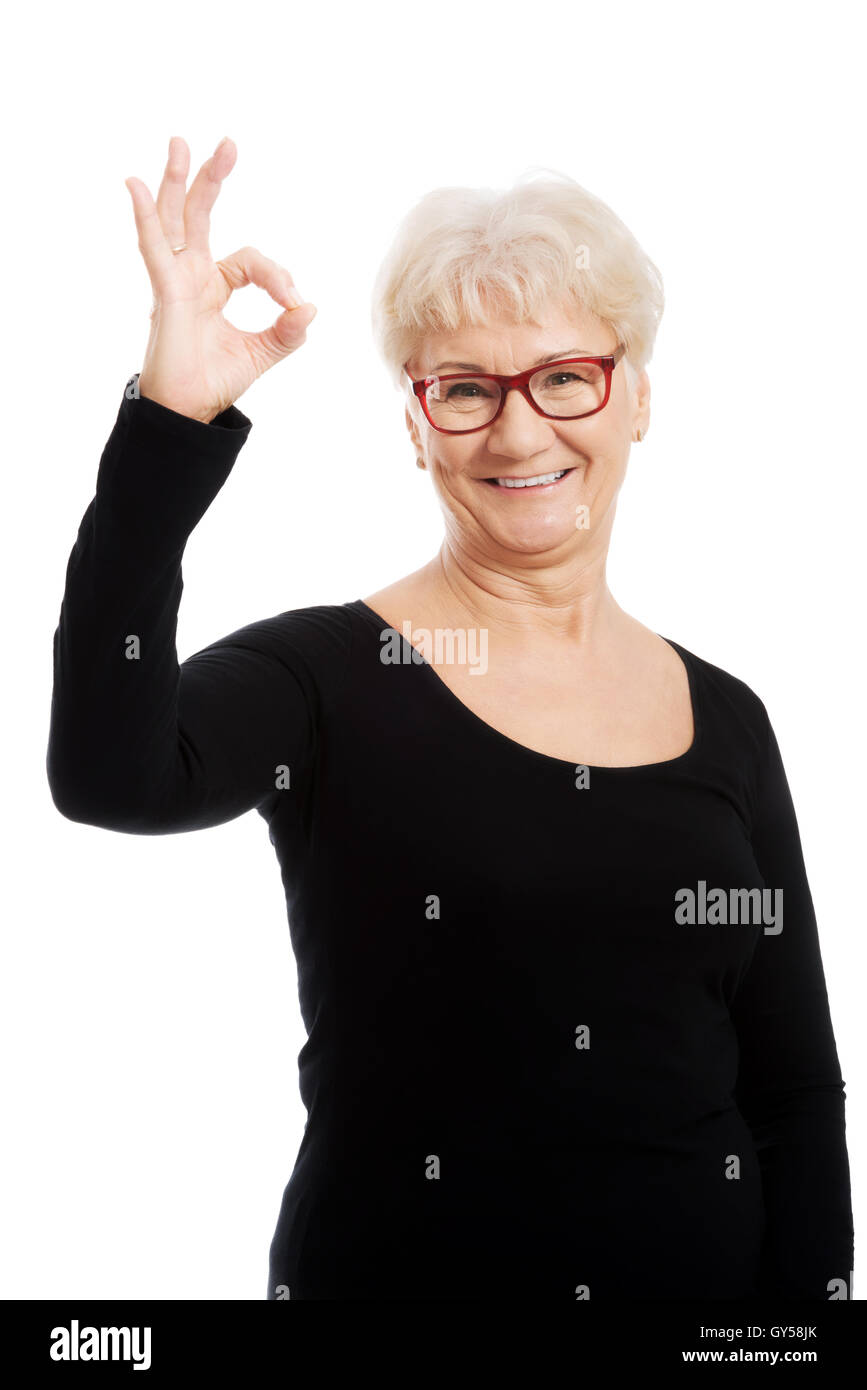 Old woman okay sign hi-res stock photography and images - Alamy