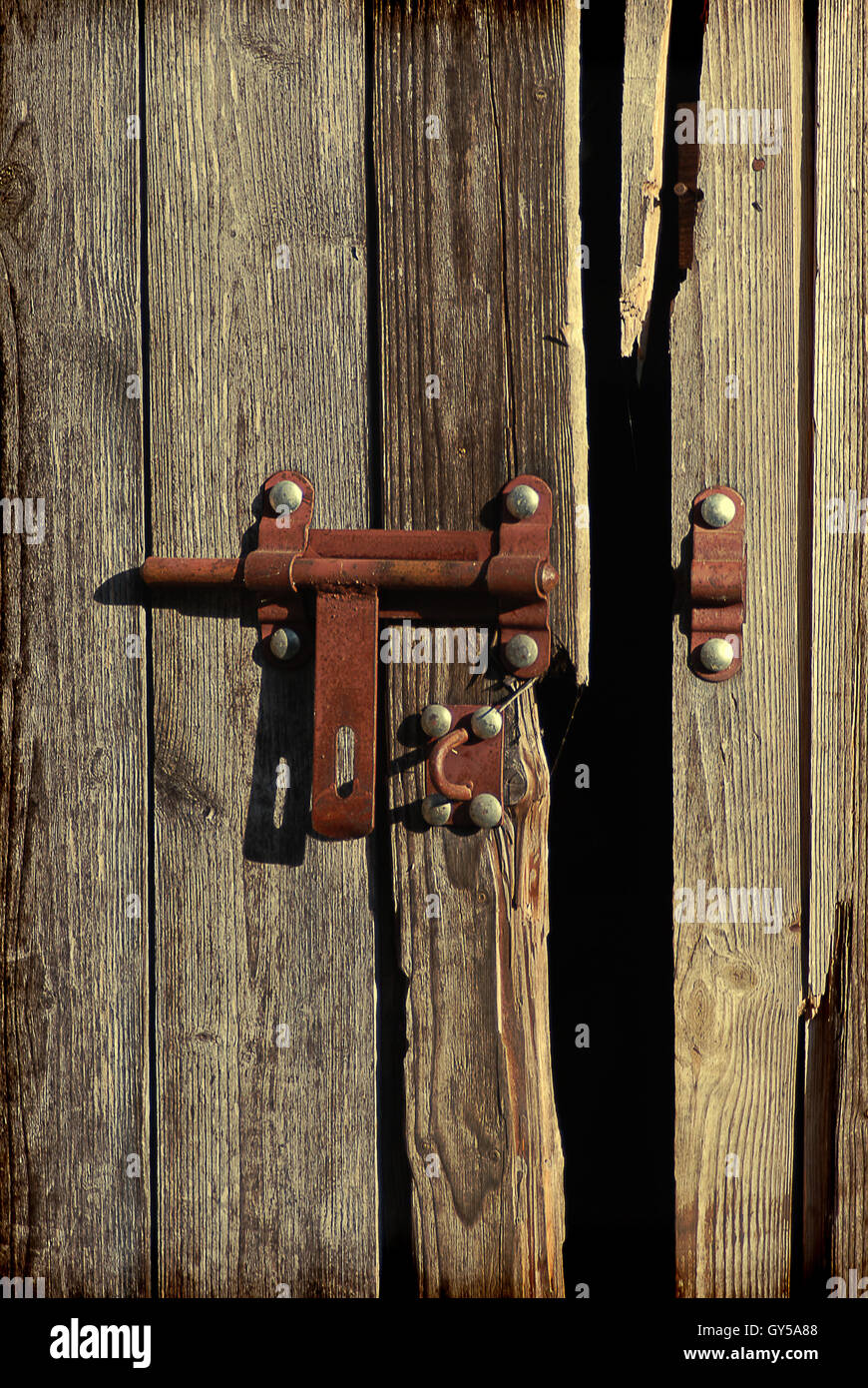 iron bolt on wooden door Stock Photo