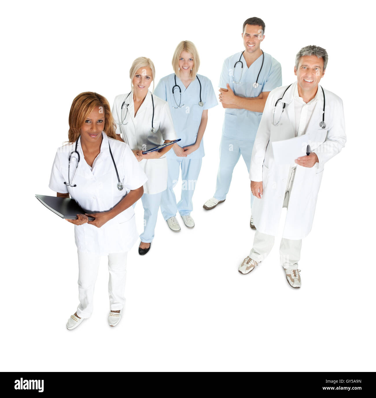 Doctors and surgeons looking up on white Stock Photo