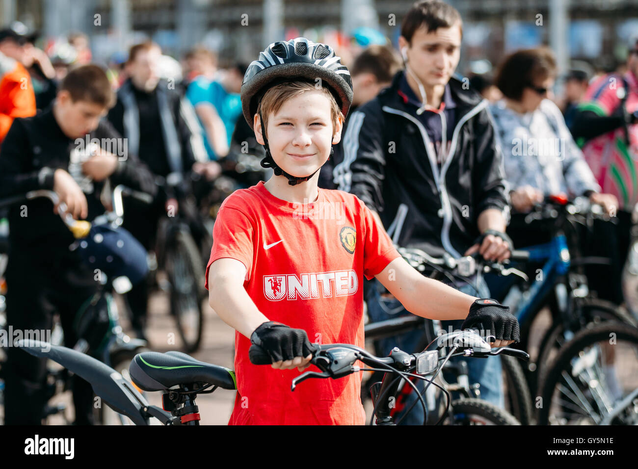 Gomel, Belarus - April 10, 2015: Boy at opening of the cycling season in the city Stock Photo
