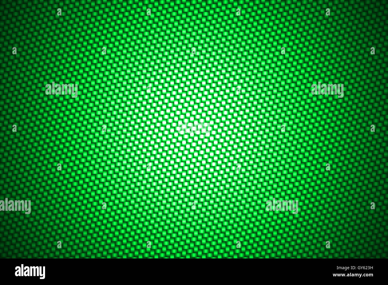 spotlight on green carbon fiber background Stock Photo Alamy