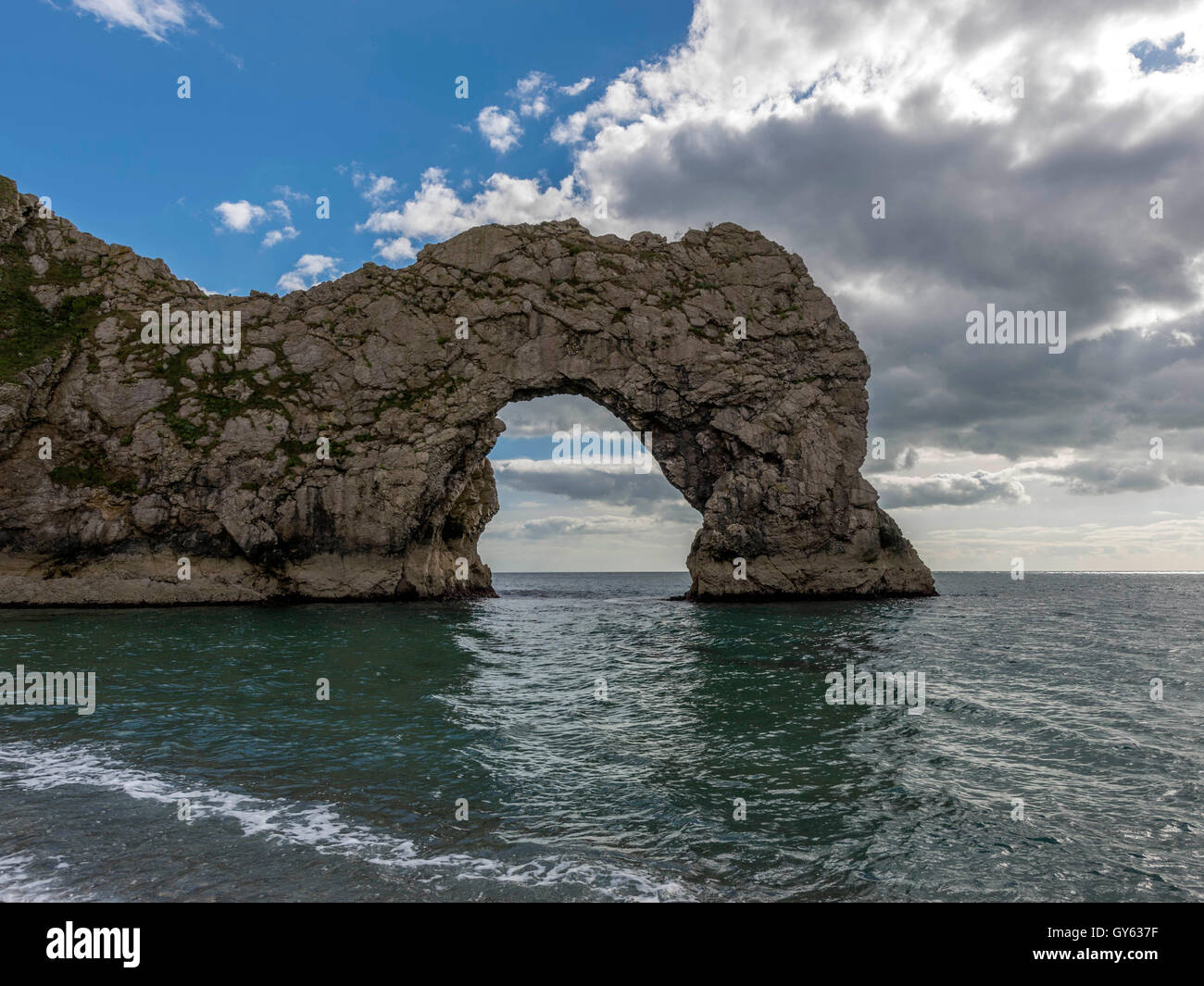 Landscape depicting the Jurassic shoreline on a fine summer day with Durdle Door in the background. Stock Photo
