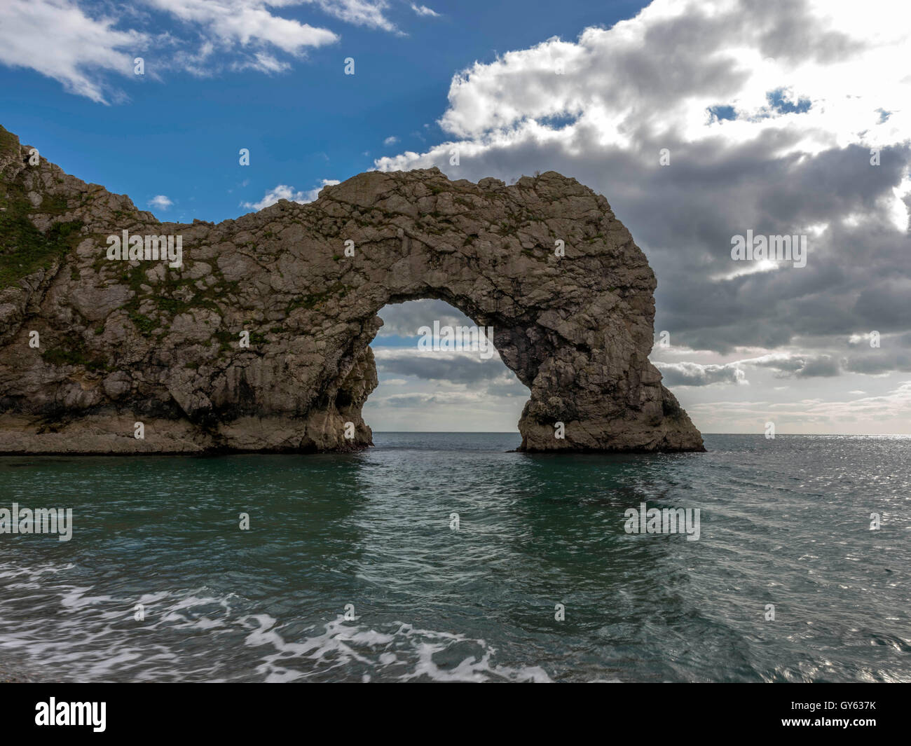 Landscape depicting the Jurassic shoreline on a fine summer day with Durdle Door in the background. Stock Photo